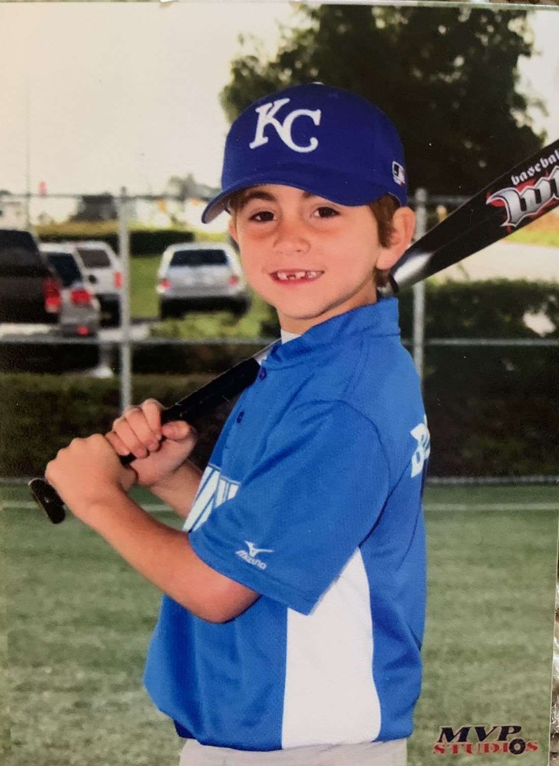 Ty as a kid in a KC cap